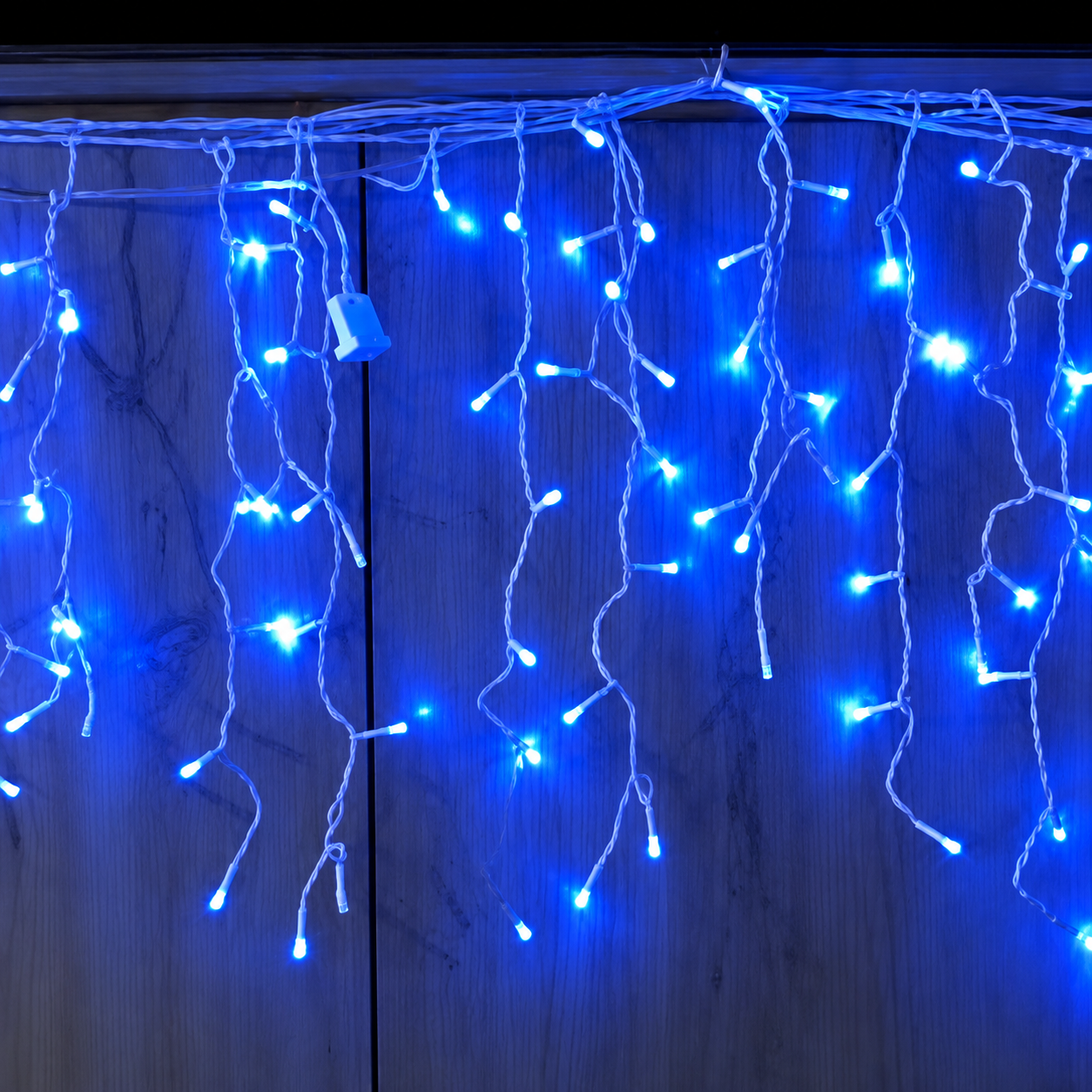 Blue icicle curtain lights